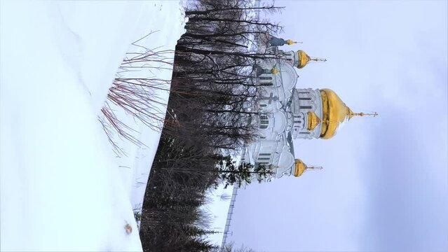 Belogorsky St. Nicholas Orthodox Missionary Monastery. Russia, Perm Krai, Belaya Gora. The temple on the hill in winter. Monastery on the background of snow. 4K