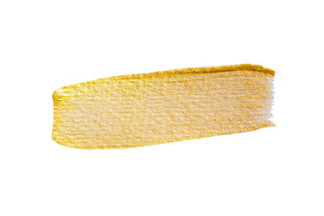 Golden paint brush stroke glittering texture.