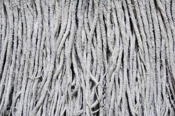 white fibre ropes from a floor mop can be used as a background