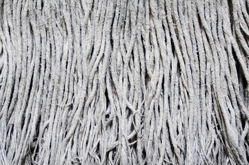 white fibre ropes from a floor mop can be used as a background