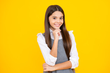 Beautiful teen girl student. Portrait of teenager school girl on isolated background. Clever...