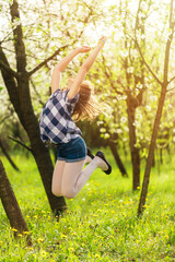 Jumping Girl In Nature