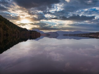 Fototapeta na wymiar Sunrise over the sproat lake