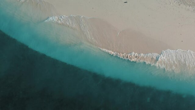 Tropical paradise with blue sea and green island in the maldives