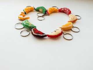 Fruit key chains on a white background