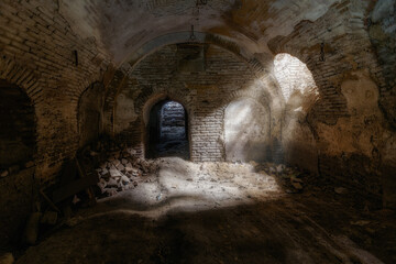 Dark underground cellar under old castle