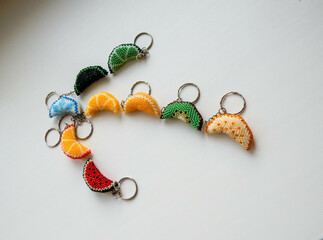 Bead colorful key chains on a white background