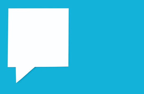 Paper Speech Bubble In The Shape Of A Square On A Blue Background. Flat White Chat Icon In The Form Of A Speech Bubble. Free Space For Text Or Advertising. Digital Internet Communication Concept