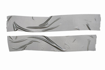 Gray adhesive tape pasted carelessly with folds on a white background. Two strips of a row of adhesive tape are glued parallel to each other. Gray construction adhesive tape