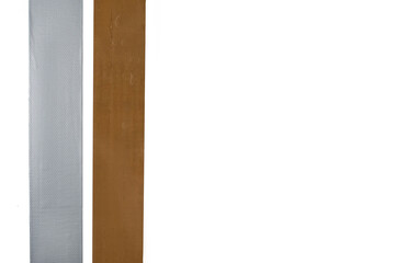 Two strips of different colored adhesive tape on a white background. Brown and gray sticky tape. For comparison, stationery and construction adhesive tape are pasted. Free space for text