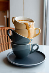 Coffee drink pouring into cups