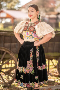 Young beautiful slovak woman in traditional dress. Slovak folklore