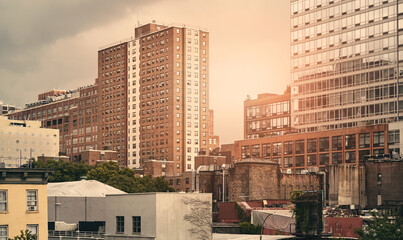 Fototapeta na wymiar New York cityscape at sunset, color toning applied, USA.