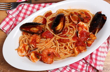 Delicious dish of spaghetti with seafood and tomato sauce. Seafood spaghetti.