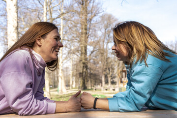 portrait of female athlete couple having fun while relaxing outdoors