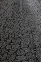 Cracks in asphalt road, Austria