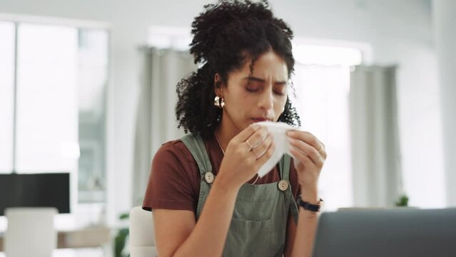 Woman, tissue and blowing nose in work from home office for allergies, covid sickness and cold virus. Sick female, remote worker and sneeze of flu, allergy or health risk of medical sinusitis disease