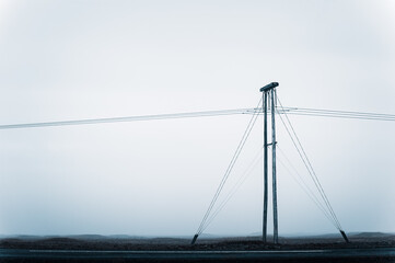 Fototapeta premium High voltage electric poles located in countryside