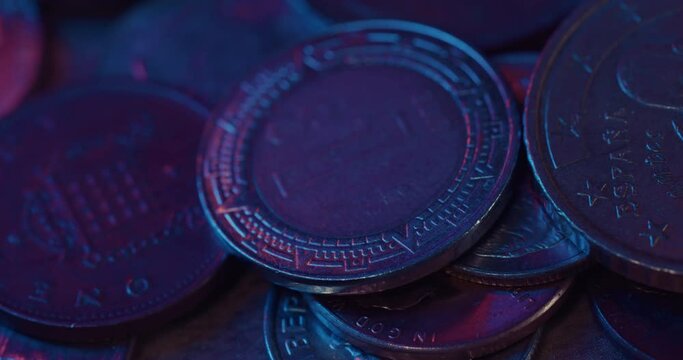 Light illuminating Spanish Peso coin - macro close up
