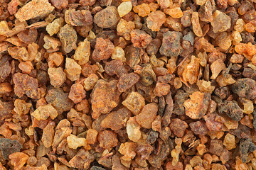Frankincense resin as background, top view. Aromatic yellow resin. Sudanese Frankincense tree.