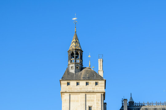 The Clock Tower of the Palais de la Cite , Europe, France, Ile de France, Paris, in summer on a sunny day.