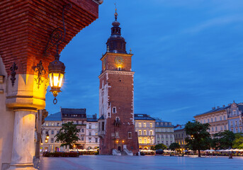 Krakow. Market square in the night lights at sunrise.