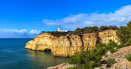 Fototapeta na wymiar Farol de Alfanzina in Carvoeiro, Lagoa (Algarve, Portugal)