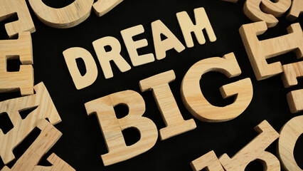 Dream big, text words typography written with wooden letter, life and business motivational...