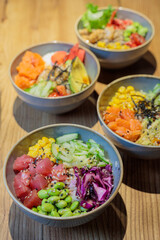 Bowls on the kitchen counter. Food court. Sets, ready-made salads. selective focus