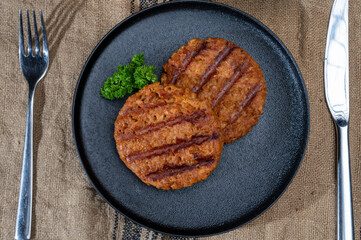 Tasty vegan burgers made from vegetarian plant based soya beans imitation meat