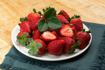 New harvest, board with fresh ripe red sweet Spanish strawberry