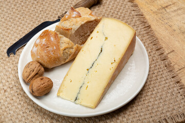 Cheese collection, French Morbier semi-soft cow milk cheese with black mold layer