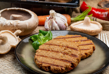 Tasty vegetarian burgers made from healthy quinoa, basil, portobello champignon and shiitake mushrooms