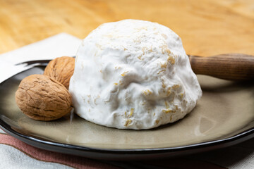Cheese collection, soft cow French cheese with mold Gaperon artisanal lavored with cracked peppercorns and garlic produced in Auvergne