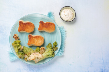 Kids food. Fish shaped nuggets with vegetable, ready to eat.