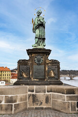 Obraz premium Statue of St. John of Nepomuk on Charles Bridge, Prague, Czech Republic.