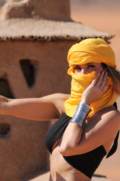 woman in bikini posing in Marroc Sahara
