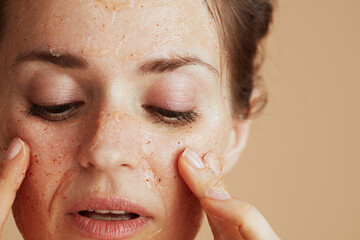 Closeup on woman with face scrub