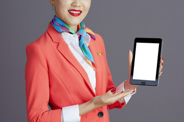Happy flight attendant asian woman digital tablet blank screen