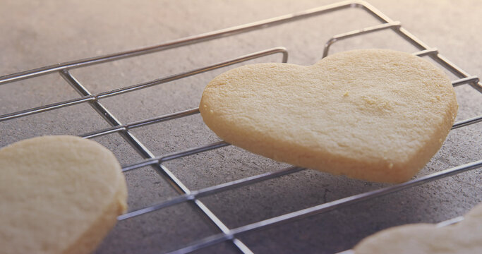Naklejka Image of close up of heart shaped cookies with copy space on steel tray
