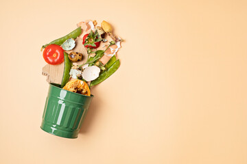 Green compost bin and kitchen leftovers. Recycling scarps, sustainable and zero waste lifestyle...