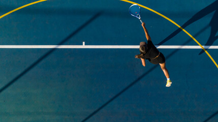 Drone Shot of Young Female Tennis Player on a New Court
