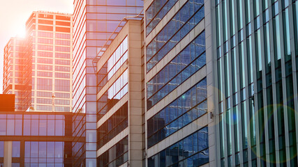 Obraz premium Blue background of glass commercial building, modern city of future. Business concept of architecture.