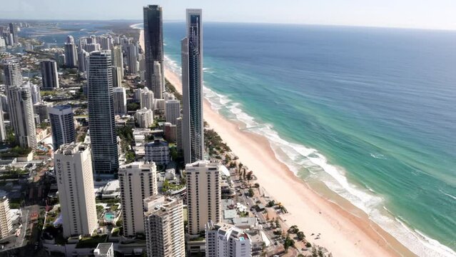 a sunny morning pan of surfers paradise looking north from the Q1 building in queensland, australia
