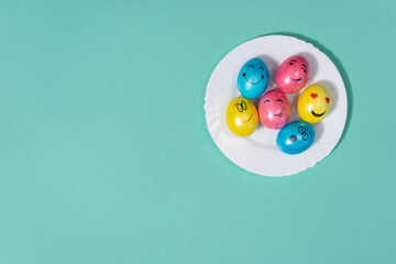 cute easter eggs with funny faces, top view