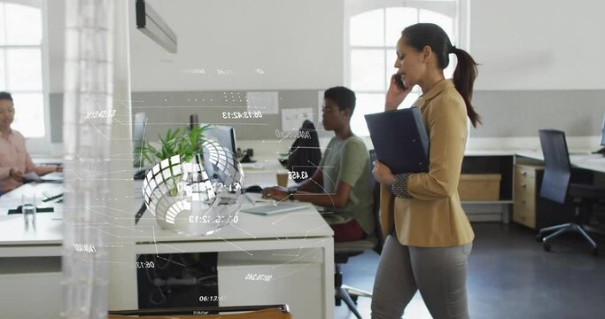 Animation of data processing and globe over biracial businesswoman talking on smartphone in office