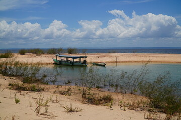 Idyllic tropical Amazon, paradise with the sandy river beach and the crystal clear waters of the Rio Tapajos, near the village of Pedra Branca,  state of Para, Brazil.