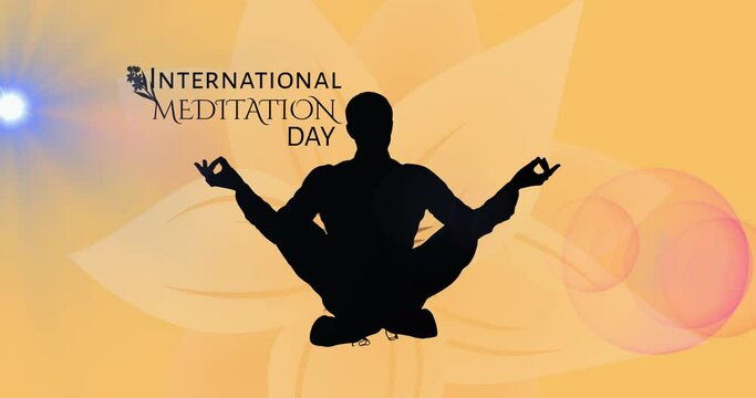 Animation of meditation day text banner and silhouette of man in yoga pose on floral background