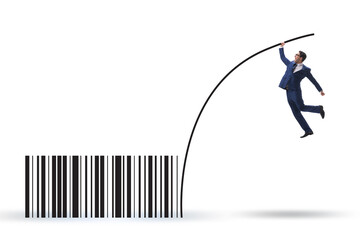 Businessman jumping over bar code in pole vaulting