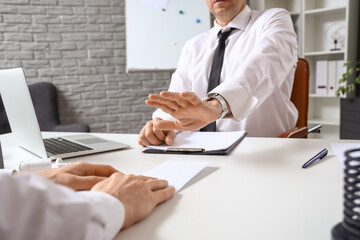 Businessman refusing to take bribe in office, closeup